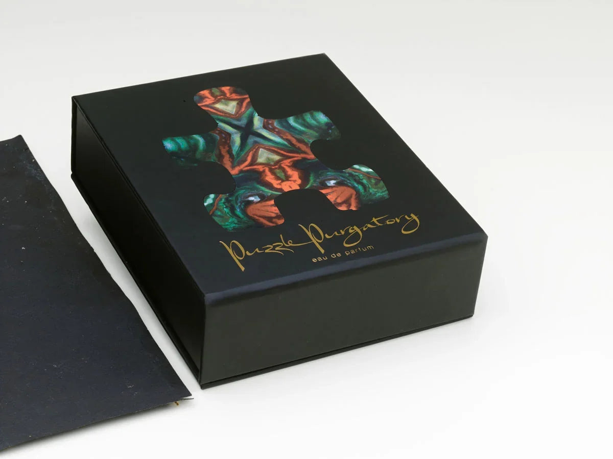 Kokudan heykele: Puzzle Parfum şişesi