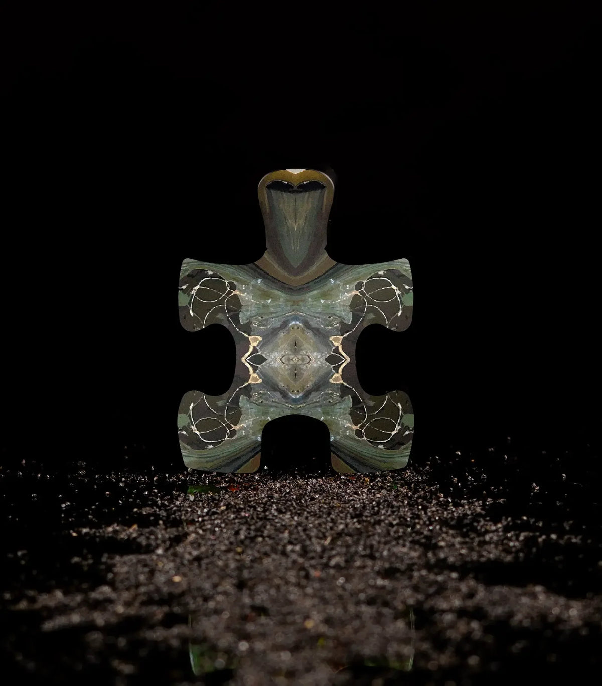 Puzzle Gece artistic niche perfume bottle, studio photograph